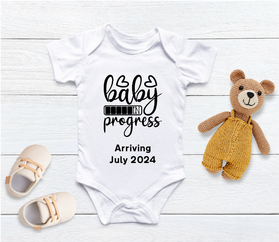 Capture your pregnancy announcement with this adorable personalised Baby in Progress baby grow! Personalised with Arrival Month; Year. Inform all your family, friends and even the world in the best way possible with a personalised short sleeved bodysuit. Share your excitement on social media platforms with the unique touch of a custom baby bodysuit. It also makes for the perfect baby shower gift.